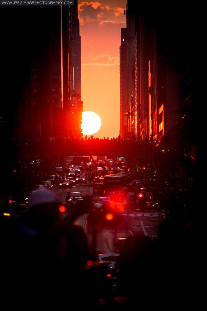 Manhattanhenge sunset on 42nd street Manhattan New York, Friday July 11, 2014.